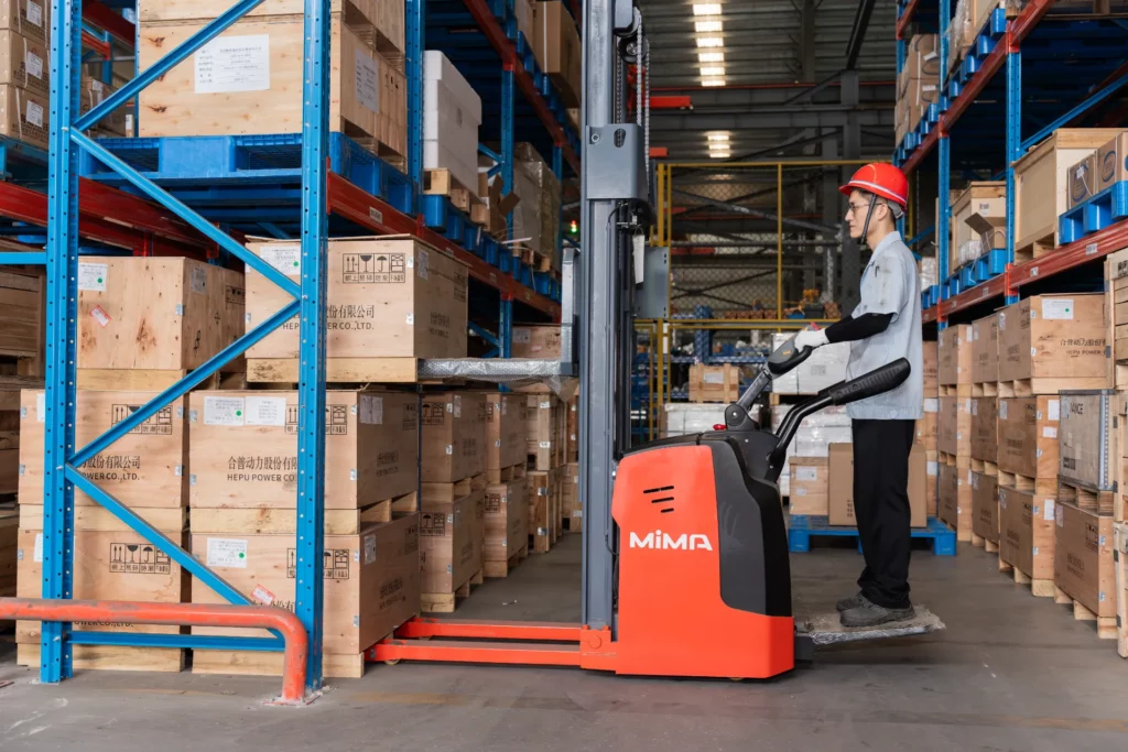 operator driving vna forklift in the warehouse